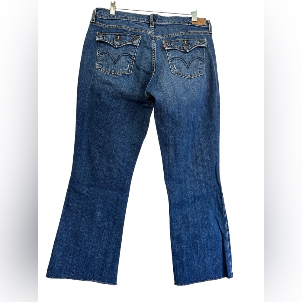 Levi’s 515 Mid Rise Boot Cut Raw Hem Size 14S (See measurements)